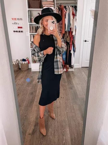 This black midi is a fall staple! I’m wearing a size small! Topped with the cutest oversized flannel. Size small #lbd #blackdress #falldress #fallbooties #ootd #falloutfit #fallstyle Midi Dress With Booties Fall, Black Dress With Flannel, Dress With Booties Fall, How To Style A Flannel Shirt, Dress With Flannel, How To Style A Flannel, Styling A Flannel, Family Fitness, Fashion Family