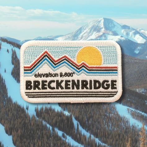 This retro patch is in tribute to all the amazing powder days we’ve spent in Breckenridge and atop its 9600’ of elevation. One of Colorado’s premier ski/snowboard locations, the town and the mountain are always throwing down! Peel and stick embroidered patch (NO iron or sewing necessary) Machine washable Dimensions: 2” W x 3” H A portion of the proceeds are donated to a local nonprofit in Colorado, scroll down for more details on your impact #givewhereyougo Outdoor Patch Design, Retro Patch Design, Patch Graphic Design, Vintage Ski Patches, Vintage Patch Design, Outdoors Graphic Design, Patch Design Ideas, Patagonia Patch, Outdoor Graphic Design