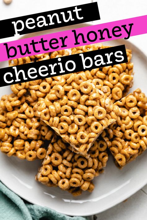 Treat yourself to a sweet snack with these delicious 3-ingredient Peanut Butter Cheerio Bars. Perfect for breakfast, coffee time, or as an afternoon snack, these ooey gooey bars are easy to make with Cheerios, peanut butter, honey, and vanilla extract. Pb Cheerio Bars, Cheerio Peanut Butter Treats, Cheerio Peanut Butter Bars, Honeynut Cheerio Bars, Peanut Butter Honey Cheerio Bars, Honey Nut Cheerios Peanut Butter Bars, Cheerios Snacks, Cheerio Treats, Peanut Butter Cheerio Bars