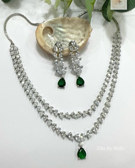 ✨Elegant and classy double layered necklace and earrings set in American Diamonds✨ Dm us or whatsapp on 0423395947 to order #ziba_by_nidhi #premiumqualityjewellery #necklace #jewelry #indianjewellery #americandiamond V Necklace, American Diamond Jewellery, Double Layer Necklace, Necklace And Earrings Set, American Diamond, Layered Necklace, Necklace And Earrings, Indian Jewellery, Earrings Set