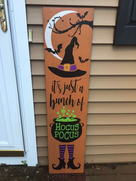 Bunch Of Hocus Pocus is a hand stenciled porch leaner Approximately 11.25 x 48 in. It has been stained and a black base coat and an orange top coat has been applied. It is then stained again and 2 coats of an exterior clear coat has been applied to enhance and protect the life of the sign. Frankenstein Porch Leaner, Hocus Locus Wood Sign, Nightmare Before Christmas Porch Sign, Grinch Porch Leaner, Hocus Pocus Porch Sign, Stenciled Porch, Leaner Boards, Hocus Pocus Sign, Hocus Pocus Decorations