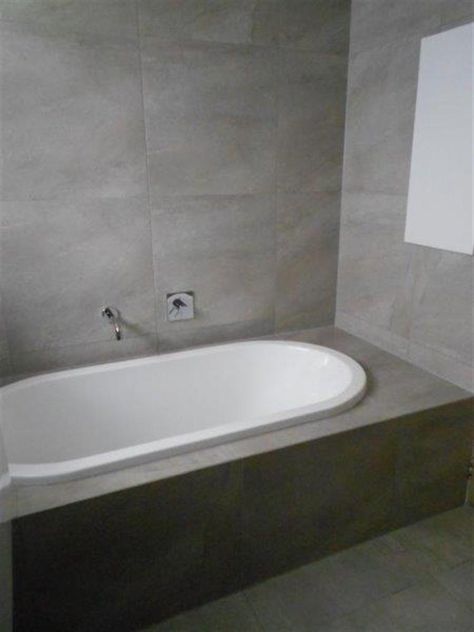 Bath with wall spout - I don't think we have room for such a large tiled surround though. Built In Bathtub Tub Surround, Tile Around Bathtub, Bath Surround, Bathtub Surround, Bathtub Spout, Built In Bathtub, Narrow House Designs, Built In Bath, Bathtub Tile