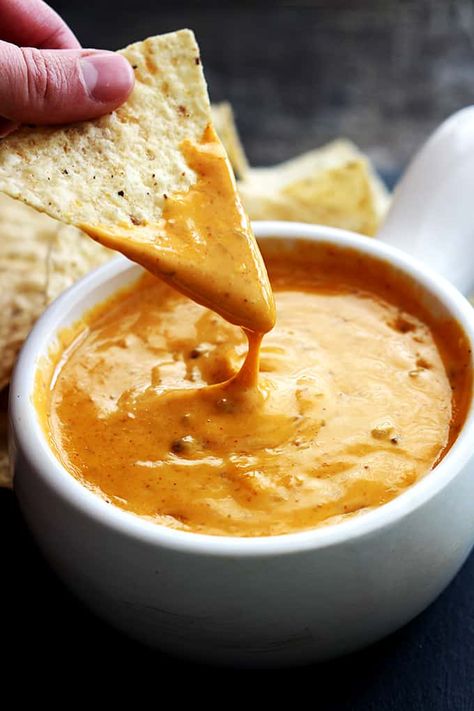 Copycat Chili's Queso that tastes so much like the original everyone will think you bought it at the restaurant! Just 5 minute prep and made in the crockpot! Chilis Skillet Queso Dip Crock Pot, Chilis Skillet Queso Dip Copycat, Chilis Queso, Queso Crockpot, Skillet Queso, Chili Queso, Copycat Chili, Homemade Velveeta, Slow Cooker Dips