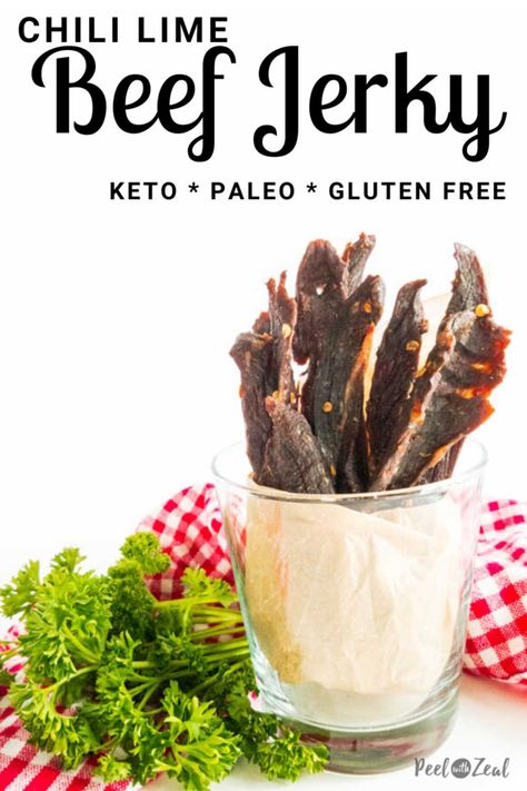 Oven Baked Chili Lime Beef Jerky- Gluten free on the go, low-carb high protein snack. Perfect summer snack that you can make in your oven or with a food dehydrator. This recipe is a little sweet (but sugar free) and a little spicy. Making it perfect for those on a keto or paleo diet. #peelwithzeal #paleosnacks #ketosnacks Keto Beef Jerky Recipe, Beef Jerky Recipe Dehydrator, Beef Jerky Marinade, Jerky Recipes Dehydrator, Jerkey Recipes, Beef Jerky Recipe, Homemade Beef Jerky, Homemade Jerky, Jerky Recipe