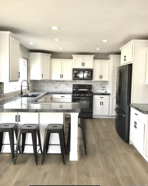 White Cabinets Black Appliances, 1925 Bungalow, Kitchen With Peninsula, Luxury Fireplace, Desain Pantry, Kabinet Dapur, Black Appliances, Kitchen Room Design, Kitchen Inspiration Design