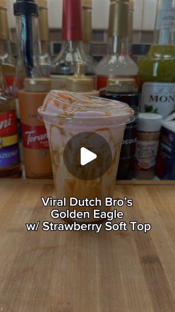 Victoria Brown | At Home Coffee & Recipes on Instagram: "Dutch Bro’s Golden Eagle Recipe with Strawberry Soft Top! 🍓I’ve been seeing this all over my for you page and I couldn’t wait to try!!! It reminds me of a Neapolitan Icecream in the BEST way🤩🍓🍫
🍓 2 Shots Espresso 
🍓 1 TBS Caramel 
🍓 1 TBS Vanilla 
🍓 Half & Half 
🍓 Ice 

Soft top⬇️ 
3 TBS heavy cream 
2 TBS Milk 
1 TBS @torani Strawberry 
1 TBS Vanilla 

Enjoy!🤩🍓
Follow @thebrownsbistro for the best at home coffee recipes. I love iced lattes and iced coffee but I can make anything! I love sharing easy coffee recipes that you can make right from your house.i can teach you the basics from making espresso, to making lattes americanos and anything in between with easy recipes that anyone can make! Let’s turn your home into a fu Dutch Bro Soft Top Recipe, Home Coffee Recipes, At Home Coffee Recipes, At Home Coffee, Iced Lattes, Coffee Shake, Easy Coffee Recipes, Water Ice, Dutch Bros