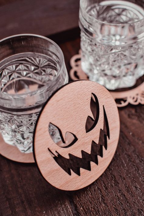 These wonderful Halloween Scary Pumpkin coasters are laser cut from high quality beech wood. They come in sets of 2, 4 and 6. The coasters are covered in clear finish to protect them from any damage and stains. ------------------ Details: ------------------ Material: high quality beech plywood Coaster dimensions: 10 x 10 x 0.4 cm (4 x 4 x 0.16 in) We offer two shipping options (if you need your item fast use express shipping as we can guarantee the exact delivery dates): - Free Standard Shipping Laser Cut Coasters, Halloween Laser Projects, Halloween Glowforge, Scary Decor, Pumpkin Coasters, Halloween Coasters, Laser Cut Coaster, Home Decor Halloween, Laser Cut Wood Earrings