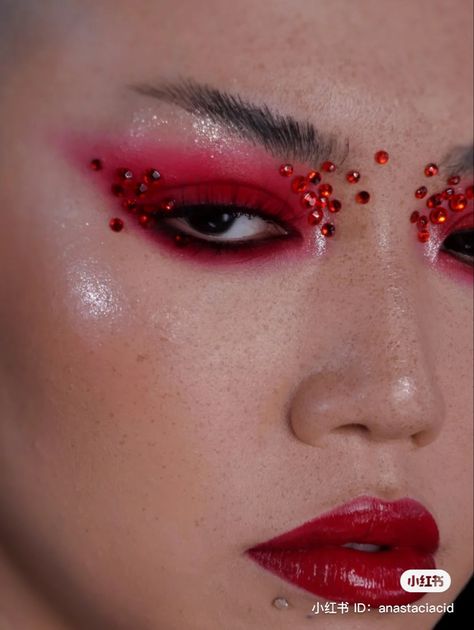 Black Smokey Eye With Gems, Red Dark Makeup Looks, Korean Editorial Makeup, Red Smokey Makeup, Jewels Around Eyes, Creative Red Makeup Looks, Deep Red Eyeshadow Looks, Smokey Red Makeup, Red Party Makeup