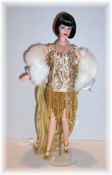 My redefinition of a 1920's Flapper issued by Mattel in the early 1990's. I switched the doll, shoes, and necklace to give her more authenticity. Barbie Birthday Party Outfit, Flapper Dress Pattern, Yellow Barbie, 1990s Barbie Dolls, 1990s Barbie, Barbie Dolls Of The World, Roaring 20s Fashion, Flapper Fashion, Hair Dolls