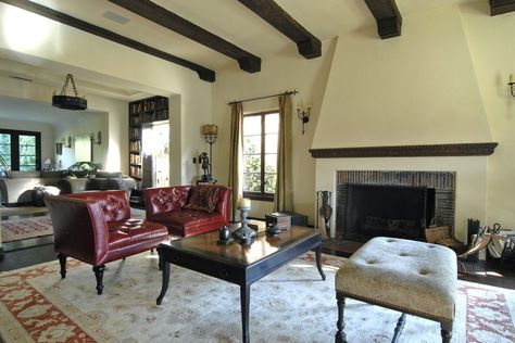 mediterranean living room by Brenda Olde note wood detail mantle Red Leather Couch, Red Leather Sofa, Mediterranean Living Room, British Colonial Decor, Colonial Furniture, Colonial Design, Colonial Decor, Furniture Living Room, Red Sofa