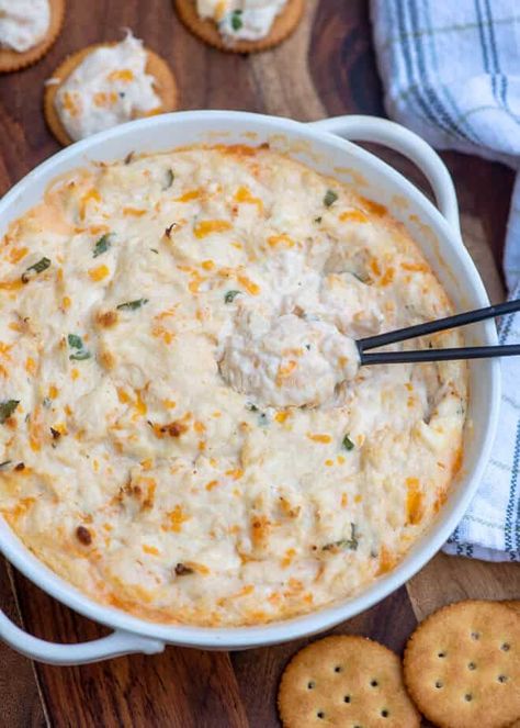 This Cheesy Hot Crab Dip is the ultimate party snack! Lump crab meat is baked into this luxurious dip with cream cheese, sour cream, sharp cheddar cheese and few dashes of hot sauce. Fresh Crab Dip Recipe, Hot Crab Dip Recipe, Crab Dip Recipe, Seafood Dip, Lump Crab Meat, Hot Crab Dip, Lump Crab, Crab Dip, Cream Cheese Dips