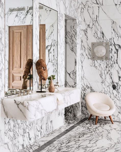 A sculpted Arabescato Corchia marble basin floating in a NYC bathroom by @juliehillmandesign ——— Photographs by @manoloyllera Marble Bathrooms, Arabescato Marble, Bathroom Lights, Bathroom Design Inspiration, Bathroom Trends, Stone Surface, Marble Bathroom, Powder Rooms, Bathroom Inspo