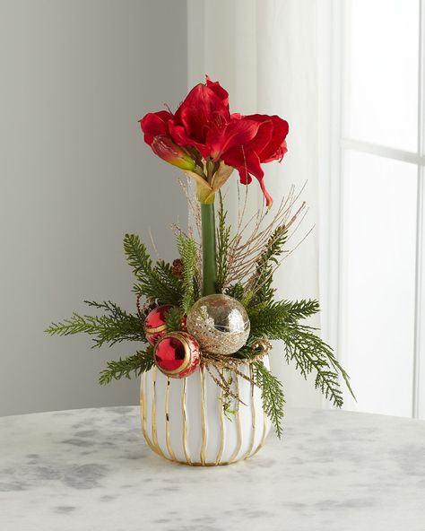 "Find T & C FLORAL COMPANY Single Amaryllis Faux-floral Arrangement on Editorialist. Handcrafted amaryllis faux floral arrangement Made of plastic set in a ceramic vase filled with stones Approx. 12\"Dia. x 24.0\"W Sold individually. Item Weight (Lbs.): 3.0 Wipe clean Made in USA" Winter Floral Arrangements Home, Amaryllis Arrangement Christmas, Xmas Bouquets, Amaryllis Centerpiece, Amaryllis Arrangement, Christmas Floral Arrangements Diy, Amaryllis Christmas, Christmas Arrangements Centerpieces, Christmas Floral Designs