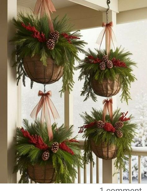 Holiday Hanging Baskets, Front Porch Hanging Baskets Winter, Hanging Winter Baskets, Christmas Porch Hanging Decor, Hanging Christmas Baskets Front Porches, Diy Christmas Hanging Baskets, Hanging Christmas Planter, Outdoor Hanging Christmas Decor, Outdoor Christmas Hanging Baskets