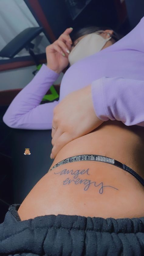 Side Of Stomach Tattoo For Women Words, Name Tattoos For Women Hip, Angel Tattoo On Hip, Name On Hip Tattoo, Small Tattoos On Buttocks For Women, Thy Tattoo For Women, Hip Name Tattoo, Angel Hip Tattoo, Small Side Thigh Tattoos