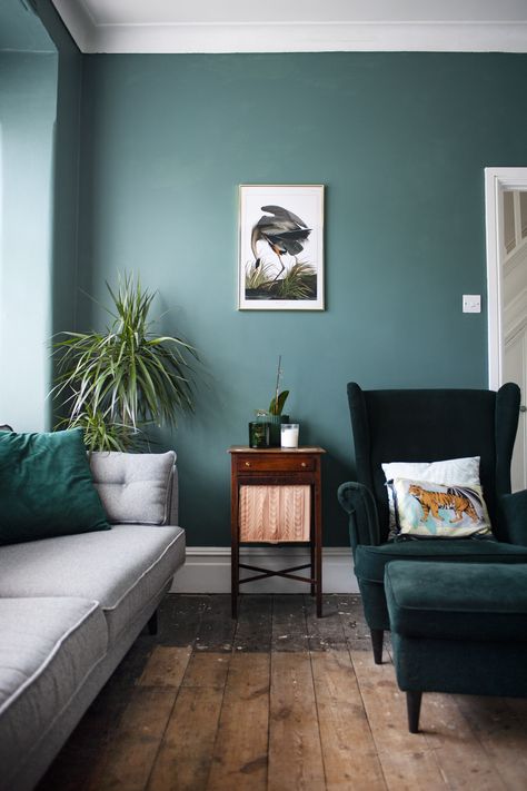 This colour is September Sea from B&Q. Together with our vintage sowing table, IKEA armchair and artwork from Juniqe. Torquise Living Room, Ikea Armchair Living Room, Sea Green Living Room, Teal Sofa Grey Walls, Blue Green Lounge, Slate Grey Living Room, Green Walls Teal Sofa, Green Wall Blue Sofa, Dark Green Armchair Living Rooms