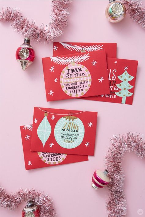 Christmas mail art: 4 ways to decorate a big, beautiful stack of envelopes Red Christmas Cards, Pink And Red Christmas, Illustration Tips, Hand Lettering Envelopes, Christmas Card Envelopes, Creative Design Ideas, Holiday Envelopes, Send Christmas Cards, Decorate Christmas