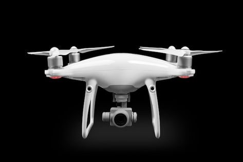 The white drone isolated on a black back... | Premium Photo #Freepik #photo #background #technology #camera #black Background Technology, Best Photoshop Actions, Dji Drone, African Grey Parrot, African Grey, Drone Photos, Background Black, Drone Quadcopter, Black Back