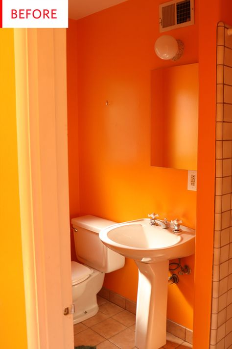 This bathroom was very orange, but no longer. The once-colorful bathroom still has plenty of colors, just not quite as bright and "day-glo." Orange Bathroom Ideas, Orange Bathroom Walls, Orange Bathrooms Designs, Bathroom Wallpaper Ideas, Cozy Cottage Kitchen, Colorful Bathroom, Orange Bathroom, Orange Bathrooms, Beige Tile