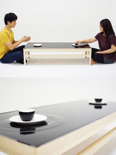 'Ripple Effect Tea Table' installation by industrial designer jeonghwa seo is a reflection of eastern mentality towards social relationships. Ripples are created on the top water layer of the table surface everytime the tea cup   and saucer are moved by the user. Table Installation, Social Relationships, Table Surface, Ripple Effect, Iconic Furniture, Multifunctional Furniture, Tea Cup And Saucer, Engineering Design, Tea Table