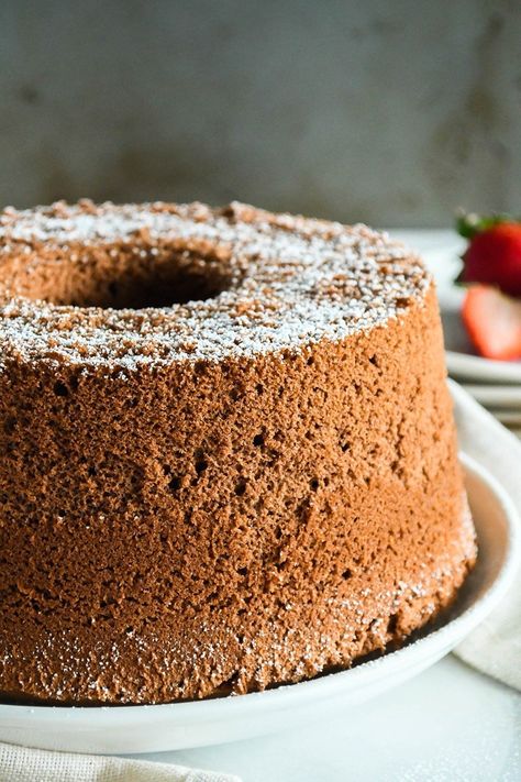 This is a dreamy chocolate chiffon cake! With real chocolatey flavour from natural cocoa, this cake is moist and super fluffy. It tastes fabulous dusted with icing sugar, frosted with chocolate buttercream or glazed with chocolate ganache. Chocolate Chiffon Cake Recipe, Chiffon Cake Recipe, Chocolate Chiffon Cake, Cake Bundt, Cake Sponge, Sponge Cakes, Sponge Cake Recipes, Icing Sugar, Just Cakes