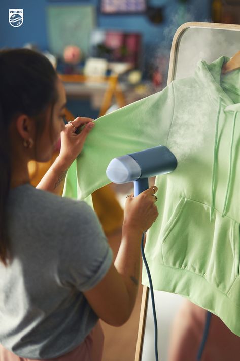 When steaming clothes with your Philips garment steamer, be sure to stretch them with your free hand to get rid of all those small crinkles and creases. Discover more tips at our link.​ Steaming Clothes, Kitchen Materials, Iron Clothes, Grill Sandwich Maker, Clothes Steamer, Mens Tools, Making Lunch, Garment Steamer, Bbq Accessories