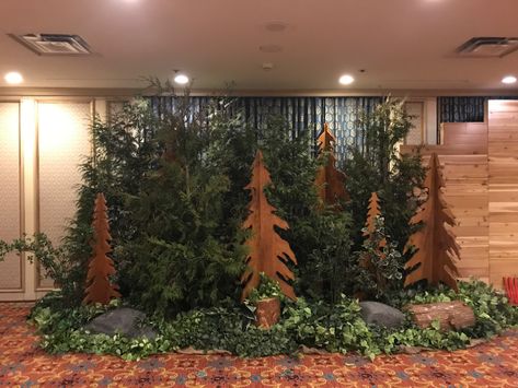 Live Evergreen Trees with Wood Cutout Tree Props // Corporate Themed Event Decor - Greenscape Design & Decor Evergreen Party Decor, Wilderness Decorations, Hoco 2023, Tree Props, Christmas Parade Floats, Mass Timber, Vbs Decorations, Gala Decorations, Fair Theme