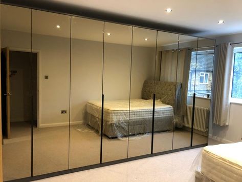 We are so pleased with this completed project. 🙌🏼 We were asked to supply and install this bespoke mirrored wardrobe, with bespoke internal wardrobe and drawer configurations.🪞😍 

At the same time our lovely clients approached us to design and build a bespoke Media Wall with inset fireplace, which we were able to undertake at the same time as this project. (view the media wall over on our profile!) 😎

For more info on bespoke fitted storage solutions for your home, visit our website! 🙌🏼 Mirror Glass Wardrobe, All Mirror Wardrobe, Profile Glass Door Wardrobe, Wall Wardrobe Design With Mirror, Walldrop Design Bedroom, Mirror Wardrobe Doors, Glass Wardrobe Design, Fitted Storage, Glass Wardrobe Doors