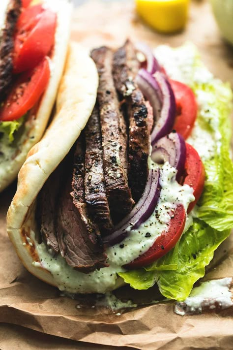 Easy and flavorful flank steak gyros with tzatziki cucumber sauce, made with a simple marinade for the beef, and creamy Greek tzatziki sauce in a soft pita. Gyro Recipe Beef, Steak Gyros, Beef Gyro, Steak Wraps, Cucumber Sauce, Steak Sandwiches, Gyro Recipe, Chimichurri Recipe, Doner Kebab