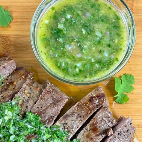 Can you make chimichurri with cilantro? Absolutely! This cilantro chimichurri (no parsley) is a delicious way to give a plain steak and salad meal a flavor boost. You’ll love how easy fresh chimichurri sauce is to make, and that it’s naturally vegan, keto, low carb, and gluten free. Get the best chimichurri recipe with cilantro, chimichurri nutrition information, and much more! . Cilantro Chimichurri Sauce Recipe, Cilantro Chimichurri Sauce, Steak And Salad, Recipe With Cilantro, Cilantro Chimichurri, Chimichurri Sauce Recipe, Cilantro Recipes, Chimichurri Recipe, Chimichurri Sauce