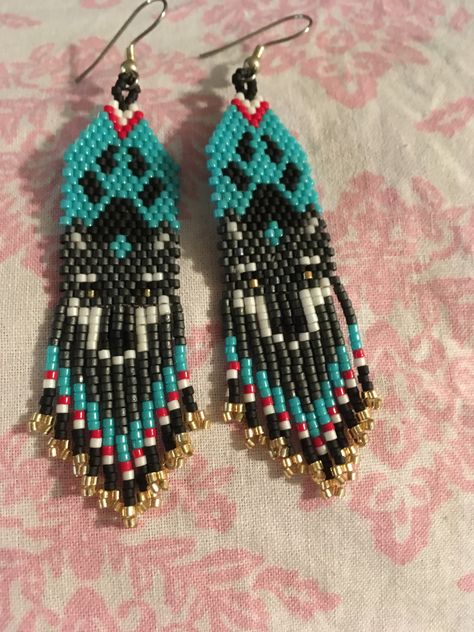 wolf seed beaded earrings Beaded Wolf Earrings, Beading Earring, Indigenous Beading, Bead Buddies, Beaded Feathers, Native Beaded Earrings, Wolf Earrings, Seed Beaded Earrings, Seed Bead Jewelry Patterns