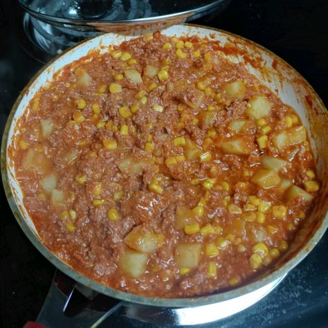 This delicious and satisfying Puerto Rican stew with corned beef, corn, and potatoes is an easy, family-friendly dinner for a weeknight. Puerto Rican Corned Beef Recipes, Canned Corn Beef Recipes, Puerto Rican Corned Beef, Canned Beef Recipe, Canned Corned Beef Recipe, Corned Beef Stew, Canned Beef, Corned Beef Recipe, Canned Corned Beef