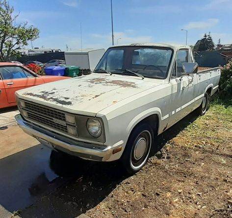 The Ford Courier was a compact pickup offering from Ford that was sold before the introduction of the popular Ranger pickup. The little happy Ford was actually a Mazda B-series pickup, and it was sold all over the world in decent quantities. Most have gone from being lawn care trucks to collectors oddities, but this next one looks like it is ready for life in a garage. #Murica #bseries #Courier #Ford #Japanese #Mazda #Pickup Ford Courier 4x4, Ford Ranger With Canopy, Ford Ranger Trophy Truck, Ford Courier, Ford Memes, In Disguise, Lawn Care, All Over The World, For Life