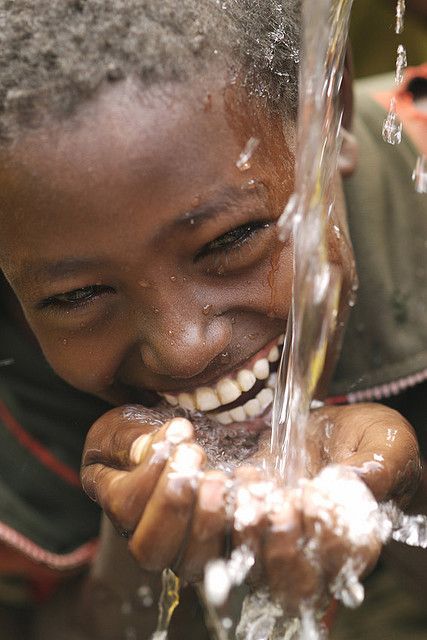 The joy of a child in Africa experiencing fresh well water for the first time. Children In Africa, Pure Joy, People Of The World, Just Smile, 인물 사진, Happy Face, Happy People, Beautiful Smile, People Around The World