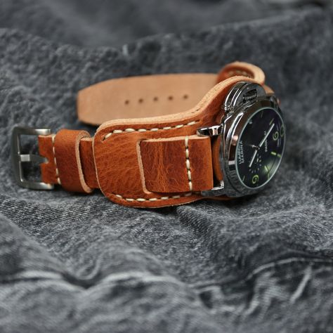 Horween Derby Leather watch strap of High quality for men. The Bund strap is unique, there cannot be two identical such straps. Handmade cuff watch band is made from vegetable tanned leather, the strap is environmentally friendly, breathable, soft and elastic, pleasant to the touch and durable. Fits perfectly on your wrist and looks stylish, enhancing the beauty of your watch. #leatherwatchstrap #watchband #bundstrap #leathercuffwatchband #horweenwatchstrap Leather Band Watches, Leather Watch Cuff, The Bund, Cuff Watch, Leather Watch Strap, Leather Watch Bands, Leather Cuffs, Watch Case, Vegetable Tanned Leather