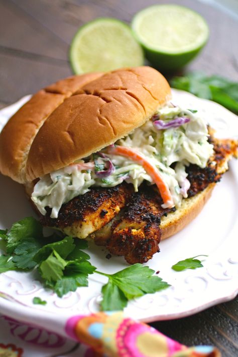 Blackened fish sandwiches with cilantro slaw are unbelievably quick to make Slaw For Fish Sandwiches, Best Fish Sandwich Recipes, Blackened Fish Sandwich, Tilapia Sandwich Recipes, Grilled Fish Sandwich Recipes, Blackened Salmon Sandwich, Crispy Fish Sandwich, Swordfish Sandwich, Whitefish Recipes