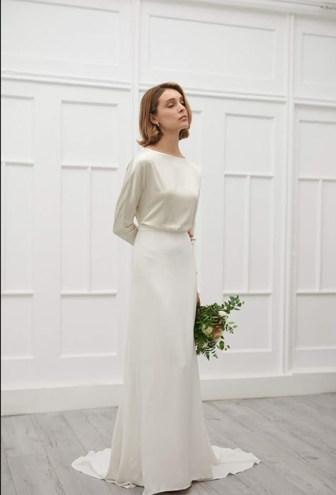 Simple Wedding Dress With Buttons, Minimalist Wedding Dress Sleeve, Long Sleeve Wedding Dress Minimalist, Modest Minimalist Wedding Dress, Simple Structured Wedding Dress, Modern Minimalist Wedding Gown, Satin Long Sleeve Wedding Dress, Wedding Dress Sophisticated, Sleek Wedding Dress