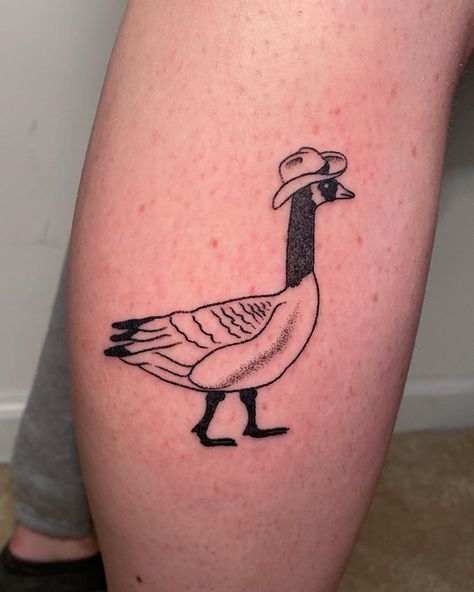 the_whispering_toilet_roll on Instagram: “There’s a new sheriff in town 🤠 Cowboy goose on the calf for Bria. Always down to tattoo birds in hats!” Simple Goose Drawing, American Traditional Goose Tattoo, Animals With Cowboy Hats Tattoo, Goose Tattoo Traditional, Duck Matching Tattoos, Canada Goose Tattoo, Canadian Goose Tattoo, Silly Goose Tattoo, Cowboy Boot Tattoo