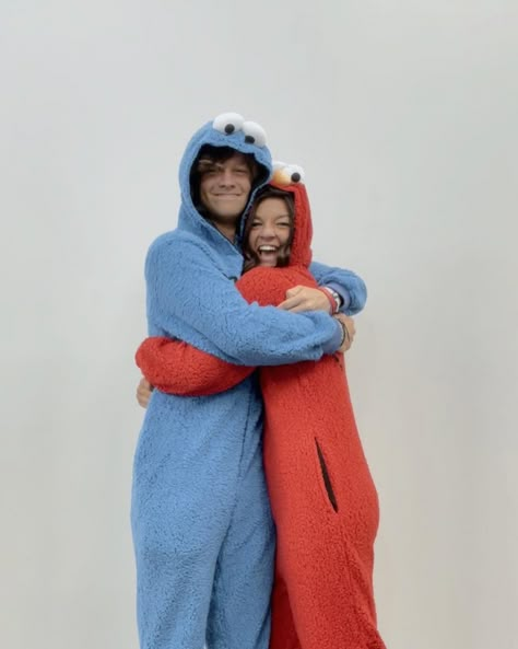 Elmo And Cookie Monster Onesies, Onesie Costumes Couple, Couples Halloween Costume 2024 Cute, Couple Halloween Costumes Onsie, Shark Onesie Aesthetic, Halloween Costumes Couples Onesies, Couple Halloween Costumes Mixed Couple, Matching Onesies For Couples Halloween, Halloween Onsies Couples