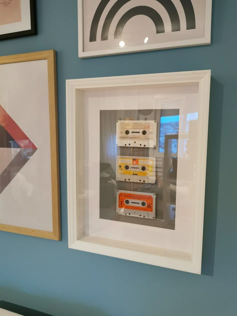 Music cassettes tape diy project Casette Tape Wall Art, Cassette Tape Display Ideas, Cassette Tape Decor, Audio Cassette Art, Cassette Decoration Ideas, 8 Track Tapes Repurposed, Old Cassette Tapes Crafts, Old Frames Ideas Wall Art, Cassette Tape Diy