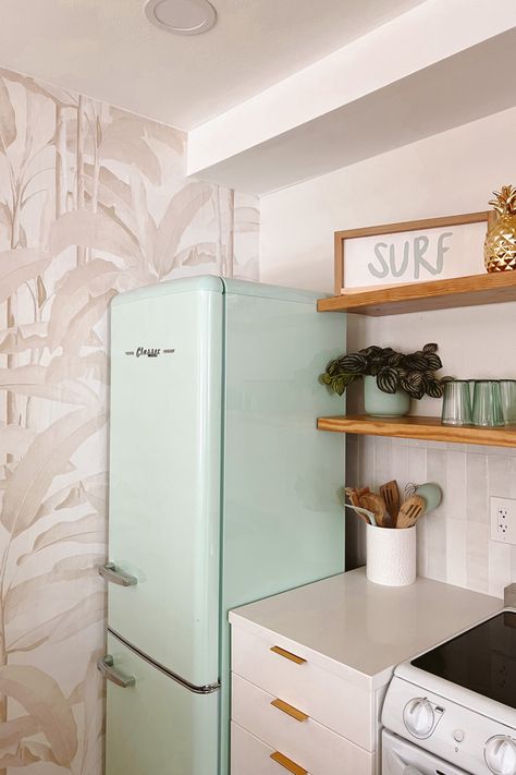 Retro teal fridge at this adorable coastal surf vibe vacation rental in Cape Canaveral Florida three blocks from famous Cocoa Beach Funky Beach House, Teal Fridge, Surf Shack Kitchen, Surf Kitchen, Retro Beach Decor, 60s Beach, Studio Remodel, Retro Beach House, Florida Bedroom