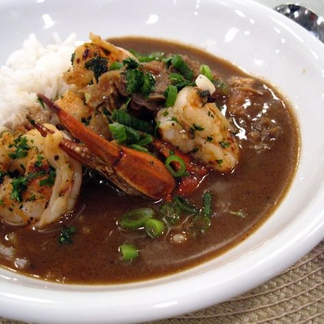 Only a week left in our countdown! Recipe #8: Emeril's Classic Seafood Gumbo -- Some form of gumbo is always on the menu at Emeril's Restaurant. This classic seafood version, which is chock-full of shrimp, fish, and oysters swimming in a broth richly flavored with gumbo crabs, is always a hit. #Emerils25 Christmas Gumbo, Seafood Gumbo Recipe, Creole Cooking, Cajun Dishes, Seafood Gumbo, Gumbo Recipe, Cajun Cooking, Creole Recipes, Cajun Recipes