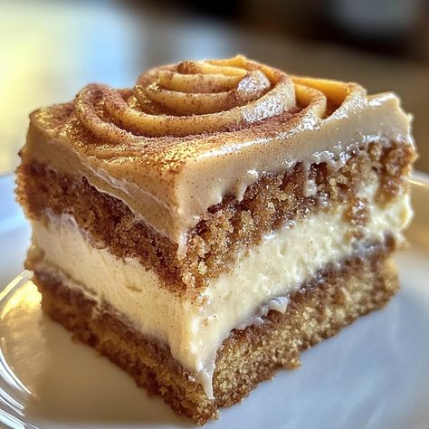 Pumpkin Spice Gooey Cake with Brown Sugar Cream Cheese Frosting  🎃🍰  Ingredients:  For the Cake Base: - 1 box yellow cake mix - 1 large egg - 1/2 cup unsalted butter, melted - 1 cup pumpkin puree - 1 tsp vanilla extract  For the Pumpkin Spice Gooey Filling: - 8 oz cream cheese, softened - 2 large eggs - 1 tsp vanilla extract - 1/2 cup pumpkin puree - 1/2 cup unsalted butter, melted - 1 tsp ground cinnamon - 1/2 tsp ground nutmeg - 1/4 tsp ground cloves - 4 cups powdered sugar  For the Brown Sugar Cream Cheese Frosting: - 8 oz cream cheese, softened - 1/4 cup unsalted butter, softened - 1/4 cup brown sugar, packed - 2 cups powdered sugar - 1 tsp vanilla extract  Directions:  1. Prepare the Cake Base:    - Preheat your oven to 350°F (175°C) and grease a 9x13-inch baking dish.    - In a lar Brown Sugar Cream Cheese Frosting, Brown Sugar Frosting, Gooey Cake, Recipes Pumpkin, Gooey Butter Cake, Pumpkin Spice Cake, Baking Items, Easy Homemade Recipes, Yellow Cake Mixes