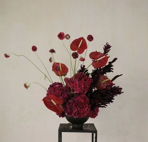 Red And Burgundy Flower Arrangements, Moody Red Florals, Red And Green Floral Arrangements, Red And Green Wedding Bouquet, Red White Flower Arrangements, Artistic Floral Arrangements, Dark Red Floral Arrangements, December Flower Arrangements, Dark Red Wedding Flowers