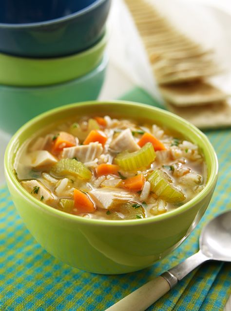 Use leftover rice and purchase a rotisserie chicken to make this super easy yet heartwarming soup. Easy Chicken Rice Soup, Easy Chicken And Rice Soup, Slow Cooker Chicken Rice, Chicken Soup Recipes Easy, Easy Chicken Soup, Easy Chicken And Rice, Rice Soup Recipes, Chicken Rice Soup, Winter Soup