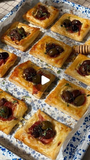 casey cheek on Instagram: "Goat Cheese, Olive, & Prosciutto Puffs 🫒🍂

If you’re looking for that perfect fall appetizer to complete your table, look no further than these Olive, Goat Cheese, & Prosciutto Puffs. I like to use @pearls_olives and the prosciutto to balance the sweetness of the honey and goat cheese. 

These pastry puffs are the perfect simple, but fancy-looking dish for now and also all of your holiday entertaining!

Ingredients (Makes 15):
1 cup Pearls Specialties Pitted Medley Olives
1 puff pastry sheet
8 oz goat cheese
2 tbsp hot honey + more to drizzle
2 tbsp olive oil
6 slices prosciutto 
1 egg 
1 tbsp water 
Fresh thyme

Directions:
1. Preheat oven to 425 F. 
2. Sprinkle a little flour on the puff pastry sheet and roll out any creases. Make sure the puff pastry is stil Goat Cheese Olive And Prosciutto Puffs, Puff Pastry Cheese Appetizers, Goat Cheese Prosciutto, Mom Lunch, Yellow Packaging, Fall Appetizer, Phyllo Recipes, Fall Appetizers, Puff Recipe