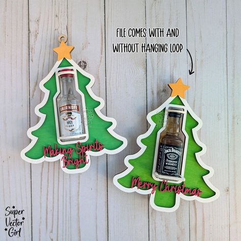 Christmas tree mini bottle holders. Compatible with small round and square bottles (last photo shows all the bottles I have tested and they fit). Enjoy 20% OFF New Release with discount Code: 20OFFNEW File link: https://www.supervectorgirl.com/products/christmas-tree-shooter-holder-svg-laser-cut-file-mini-alcohol-bottle-gift-small-round-or-square-booze-bottle-shot-shooters-alcohol-50-ml-shooters-mini-liquor-holder Happy to answer any questions. Made for 3mm (1/8 inch) thick material. Booze Christmas Tree, Mini Alcohol Bottles Gifts, Mini Alcohol Bottles, Bottle Shoot, Mini Bottle, Captain Morgan, Alcohol Bottles, Bottle Gift, Mini Bottles