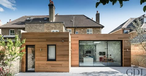 stepped extension Exterior Wood Cladding, Architecture Extension, Cladding Ideas, Flat Roof Extension, Wood Siding Exterior, Garden Room Extensions, House Extension Plans, Glass Railings, Cedar Cladding