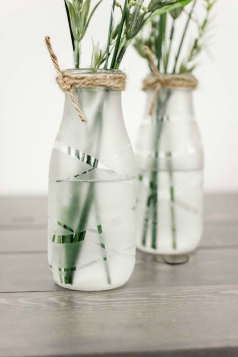 Upcycle some old milk bottles or glass containers into these beautiful and chic Glass Etched Vases! Starbucks Glass Bottle Crafts, Starbucks Bottle Crafts, Starbucks Glass Bottles, Milk Bottle Craft, Old Milk Bottles, Starbucks Bottles, Glass Bottle Diy, Glass Milk Bottles, Wine Glass Crafts