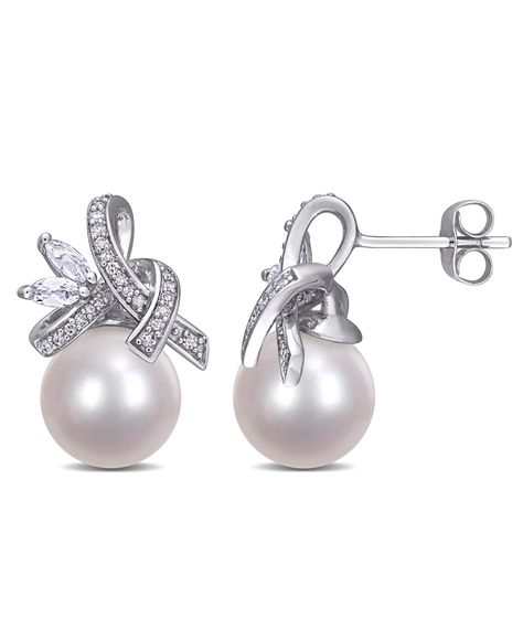 These stunning ribbon drop earrings are crafted in lustrous 10-karat white gold and feature gorgeous cultured freshwater pearls paired with marquise-cut white topaz stones and glistening diamonds in a unique ribbon design. Instantly add a touch of elegance and class to any ensemble with these stunning earrings. Pearl Ribbon, White Topaz Earrings, Diamond Ribbon, Peoples Jewellers, Pearl And Diamond Earrings, Topaz Earrings, Pearl Types, Freshwater Cultured Pearls, Stunning Earrings